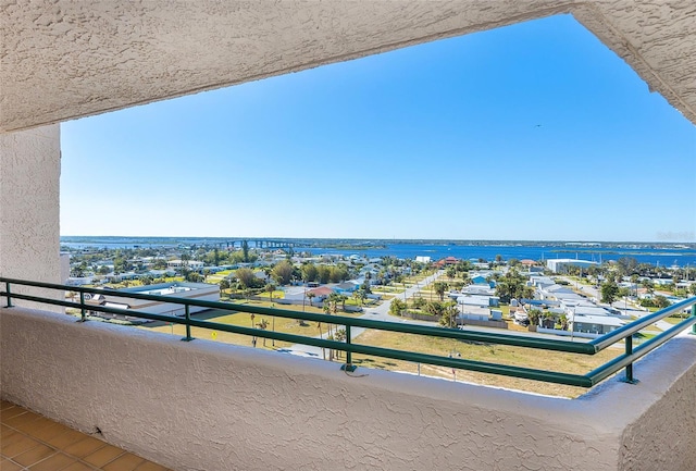 balcony featuring a water view