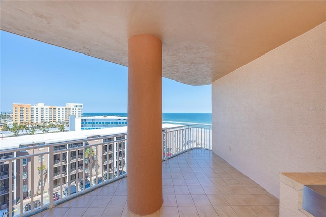 balcony featuring a water view