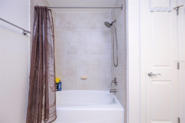 bathroom featuring shower / bath combo