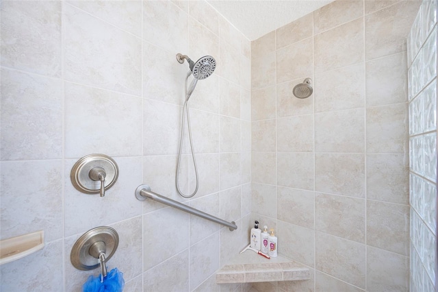 bathroom featuring tiled shower