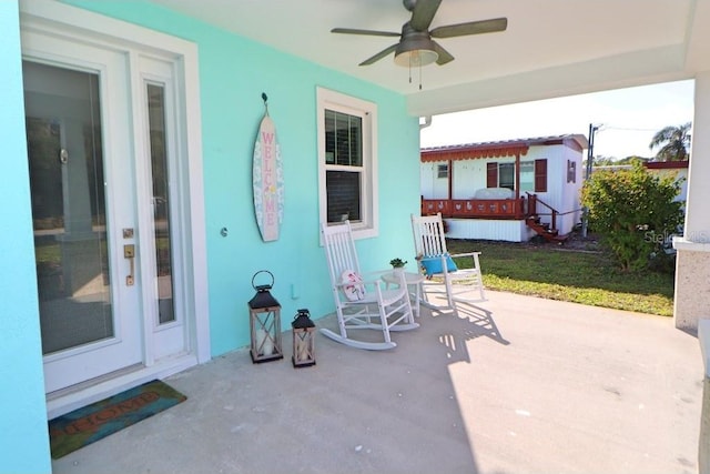 view of patio / terrace featuring ceiling fan