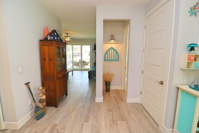 hallway featuring light hardwood / wood-style flooring