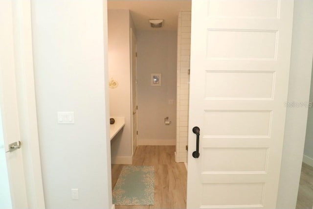 bathroom with wood-type flooring