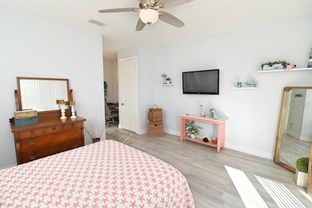 bedroom featuring ceiling fan and light hardwood / wood-style flooring