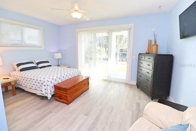 bedroom with access to outside, ceiling fan, and light hardwood / wood-style floors