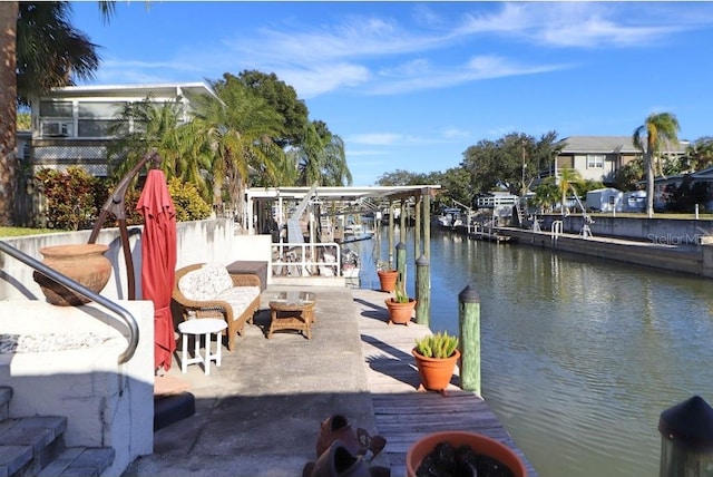 dock area featuring a water view