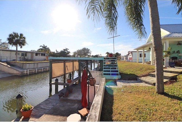 dock area featuring a water view