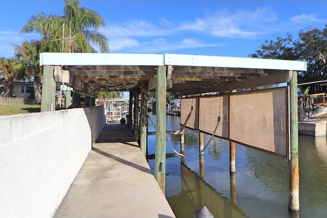 dock area with a water view