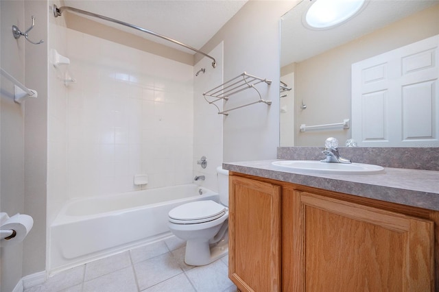 full bathroom with tile patterned floors, tiled shower / bath combo, toilet, and vanity