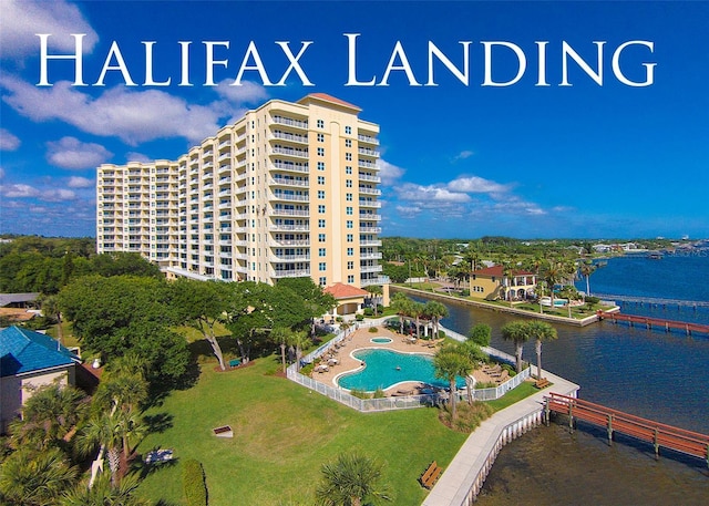 birds eye view of property with a water view