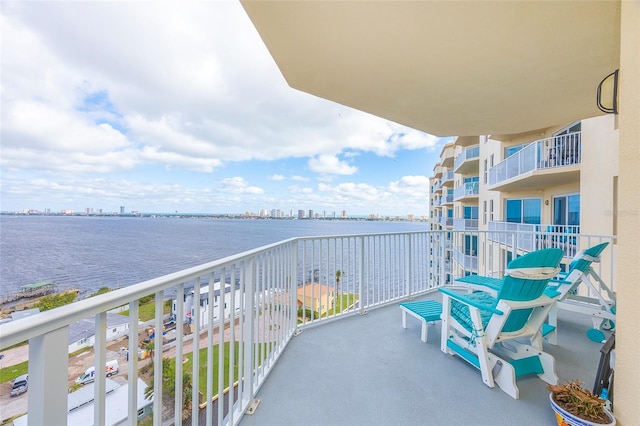 balcony featuring a water view