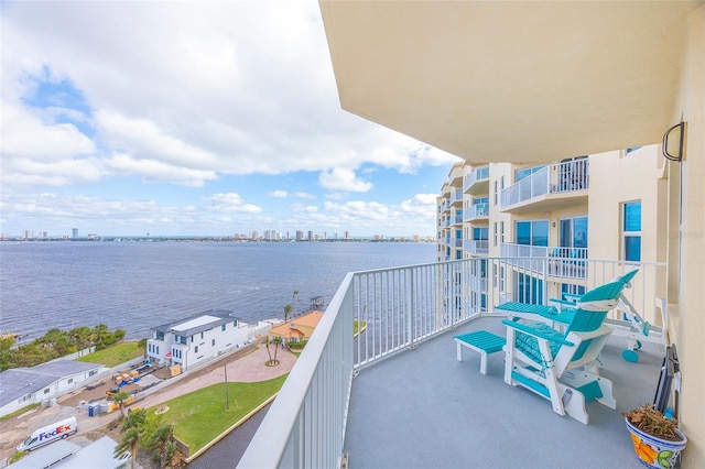 balcony featuring a water view