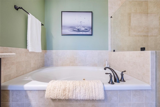 bathroom with tiled tub