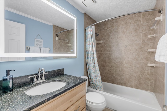 full bathroom with shower / tub combo with curtain, vanity, a textured ceiling, and toilet