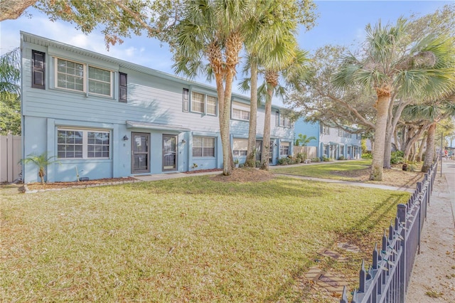 view of front of home with a front lawn