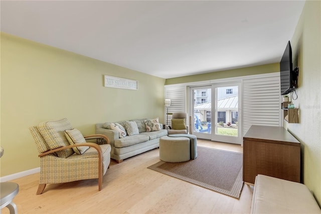 living room with light hardwood / wood-style floors