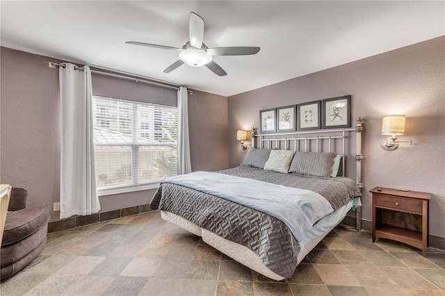 bedroom featuring ceiling fan