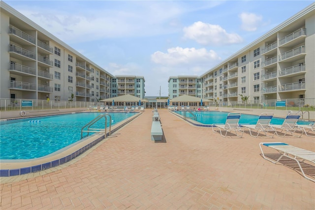 view of pool featuring a patio