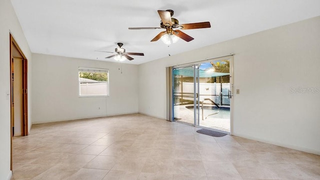 spare room with ceiling fan