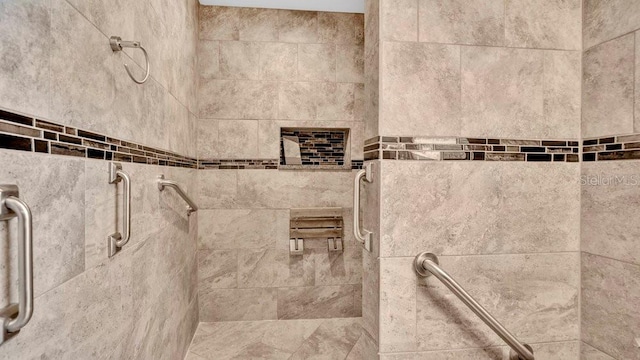 details featuring a tile shower