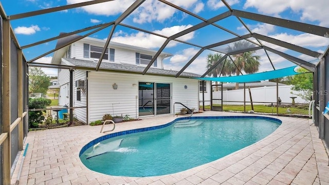 view of pool featuring a lanai and a patio area