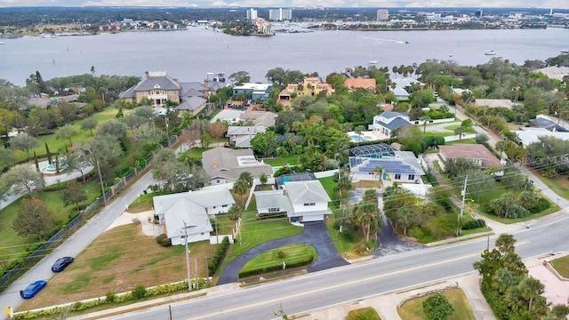 birds eye view of property featuring a water view