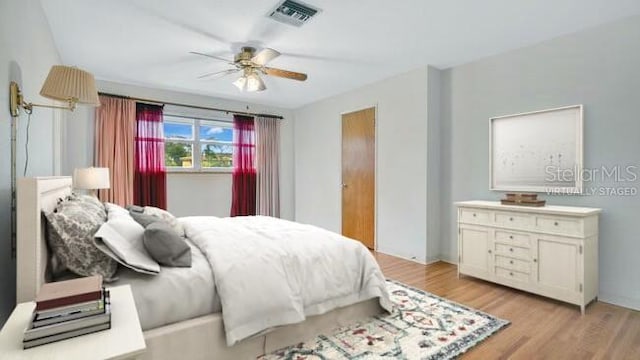 bedroom featuring ceiling fan and light wood-type flooring