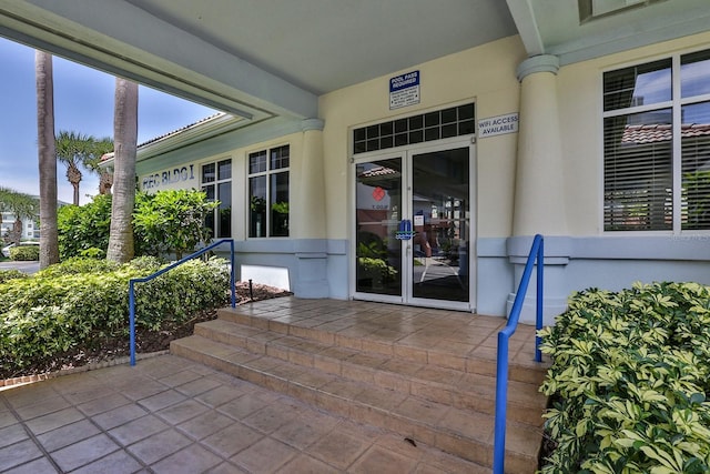 doorway to property featuring french doors