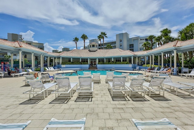 view of swimming pool with a patio area