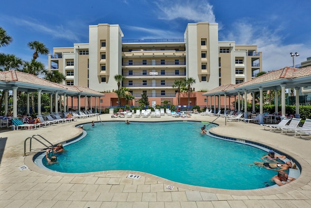 view of swimming pool featuring a patio