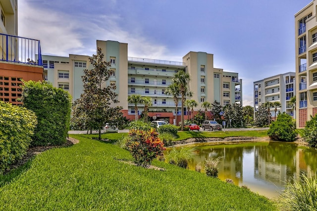 view of home's community with a water view