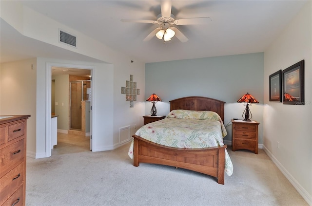 bedroom featuring light colored carpet and ceiling fan