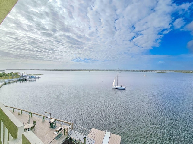 view of water feature with a dock