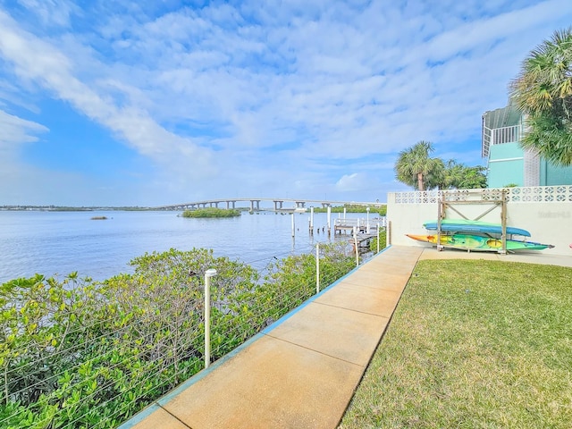 view of water feature with a dock