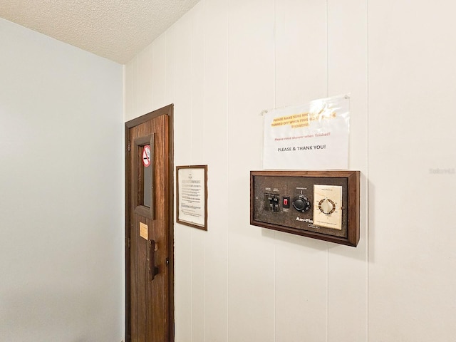 room details featuring wood walls