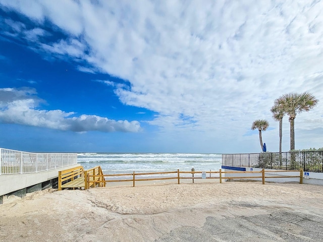 exterior space featuring a view of the beach