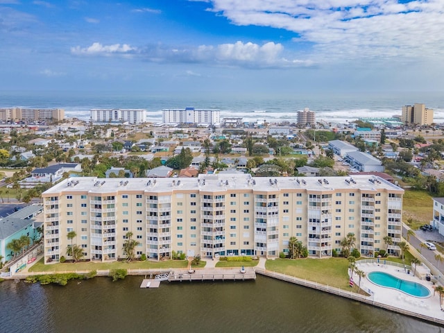 birds eye view of property featuring a water view