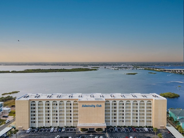3606 S Peninsula Dr Unit 404, Port Orange, FL 32127 - aerial view at dusk of a water view and a view of apartment building / complex