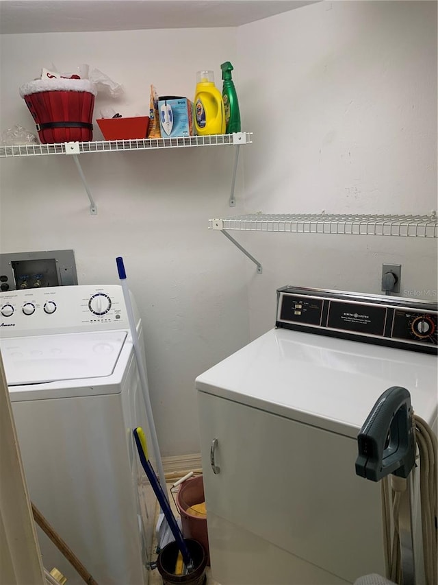 laundry area with washer and dryer