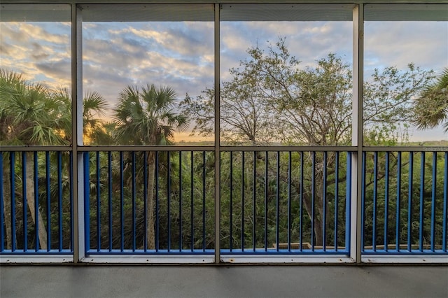 unfurnished sunroom featuring a wealth of natural light