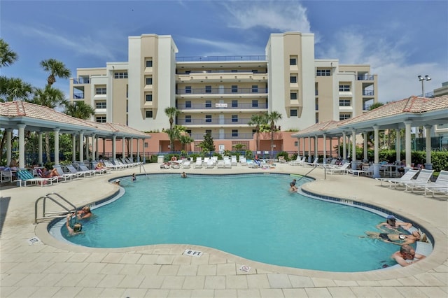 view of swimming pool with a gazebo and a patio area