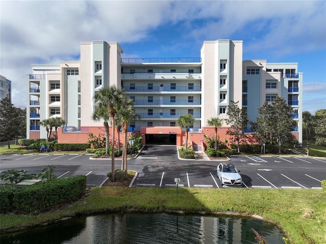 view of property with a water view