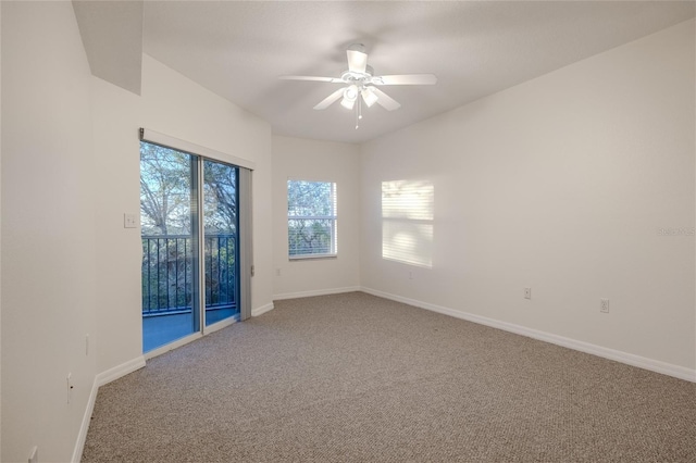 carpeted empty room with ceiling fan