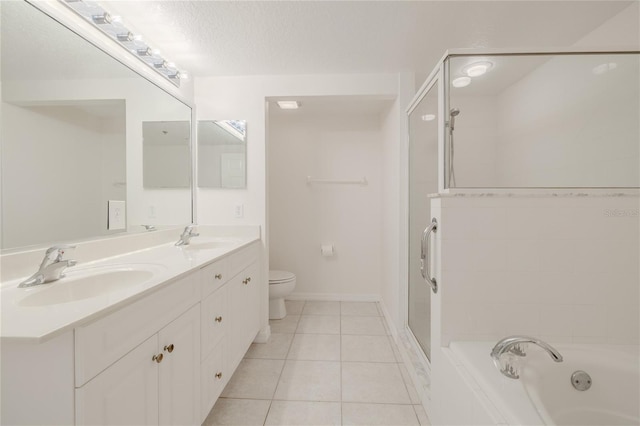 full bathroom with tile patterned floors, a textured ceiling, toilet, vanity, and independent shower and bath