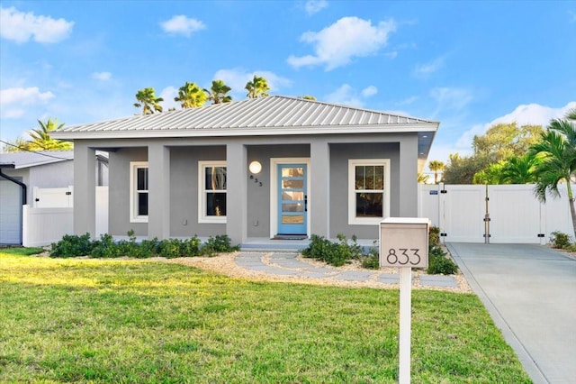 view of front of house featuring a front lawn and a porch