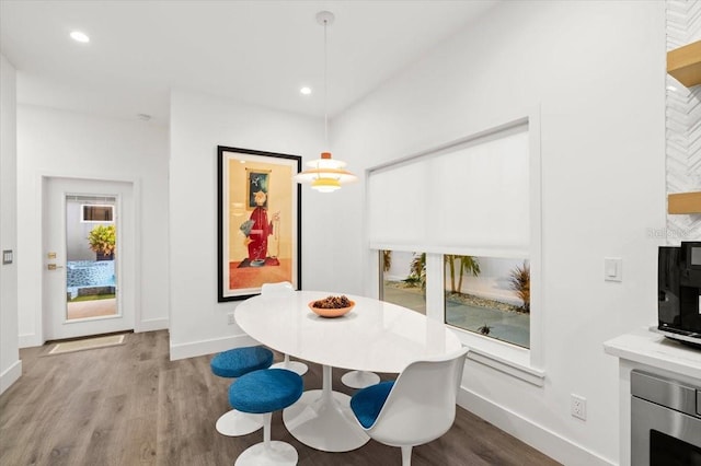 dining room with light wood-type flooring