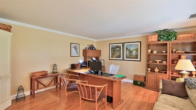 office space with crown molding and light hardwood / wood-style floors