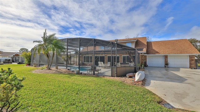 back of property with a lawn and glass enclosure