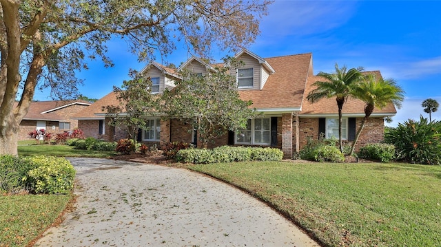 view of front of house with a front lawn