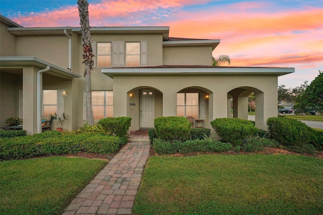 view of front of home featuring a yard